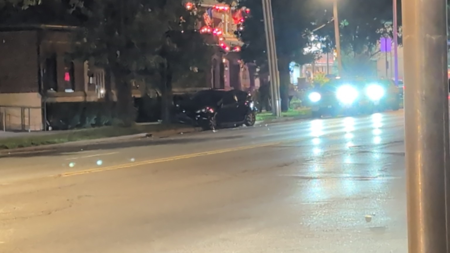 Street traffic and response lights after dark.